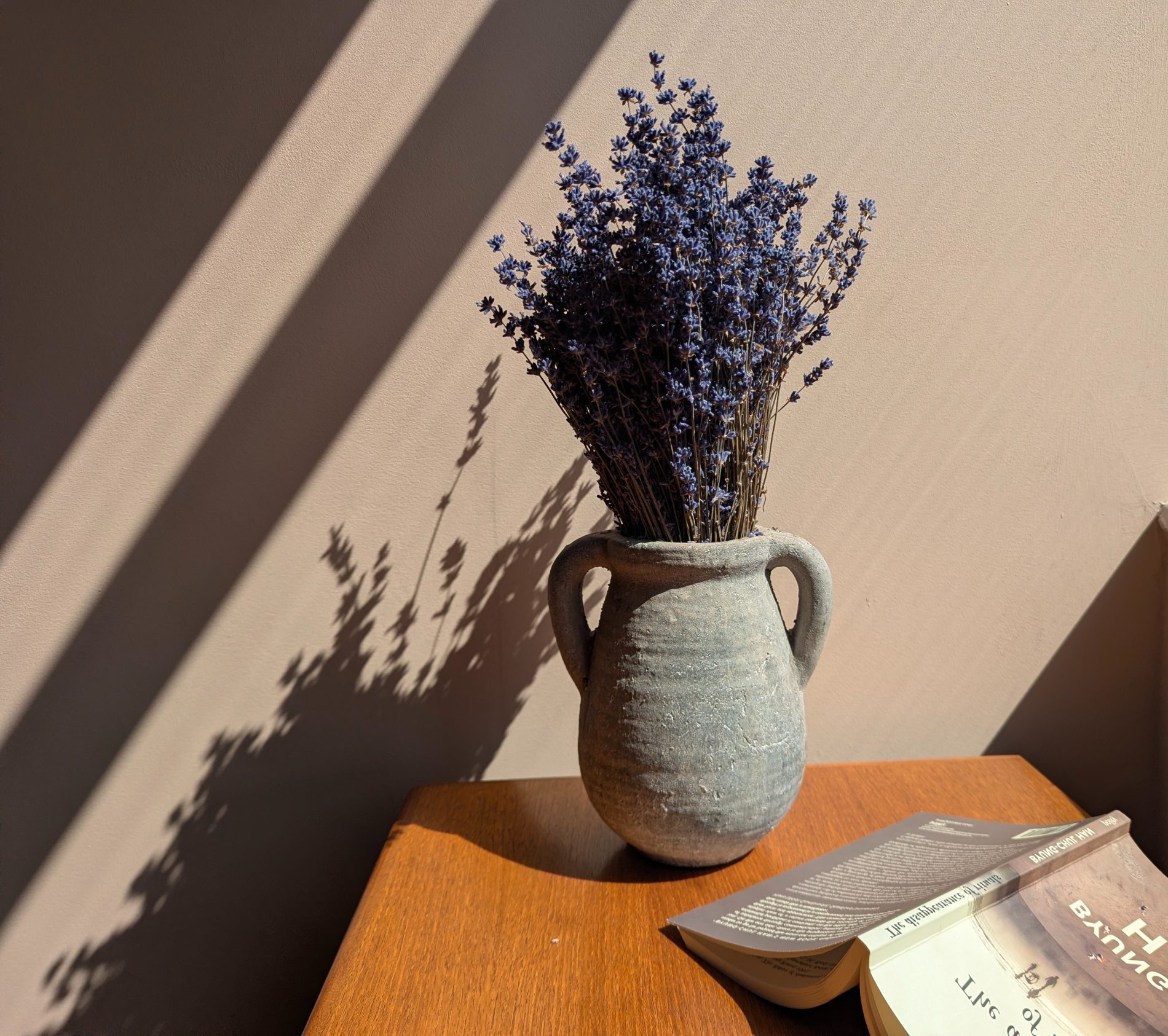 Dried lavender in a vase by the window
